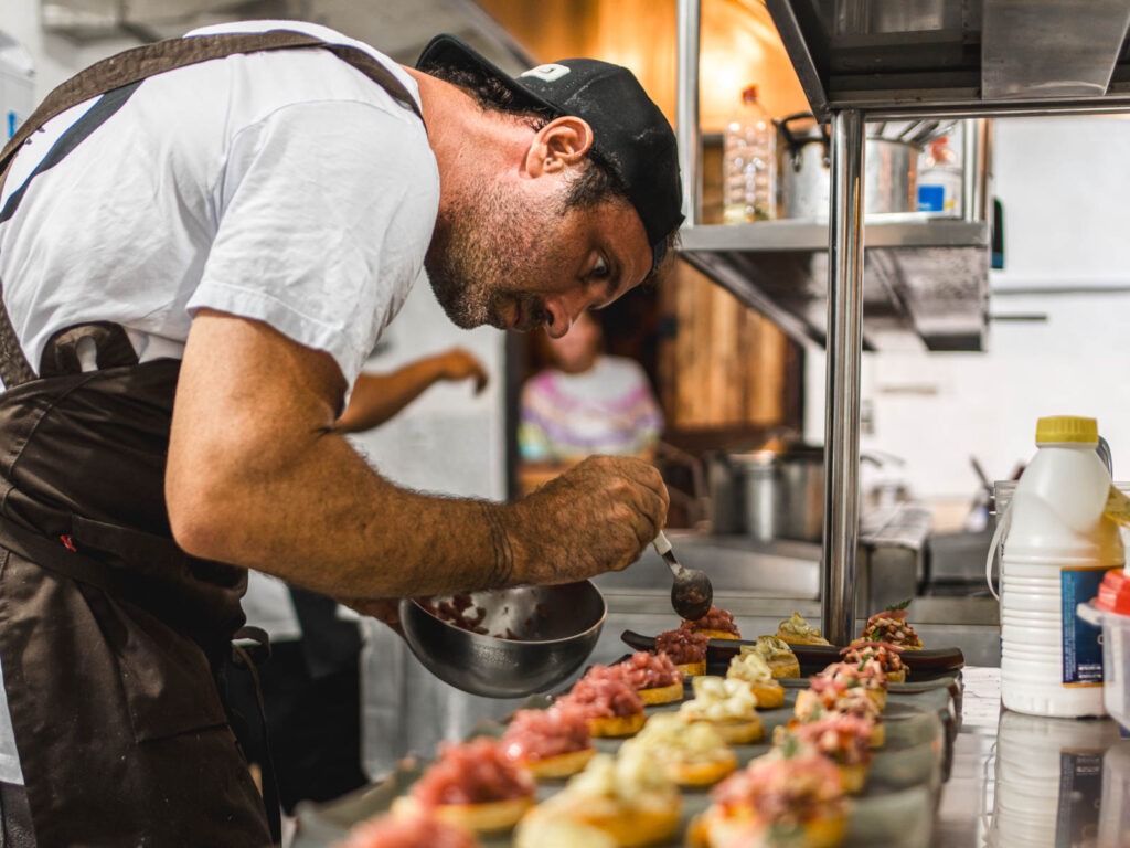 Dominik preparing food at DoMar restaurant