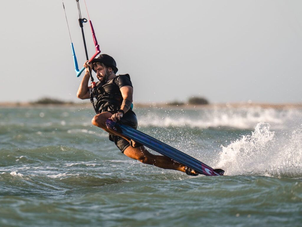 Aleksei pulls a darkslide during SA Masterclass kiteboarding camp
